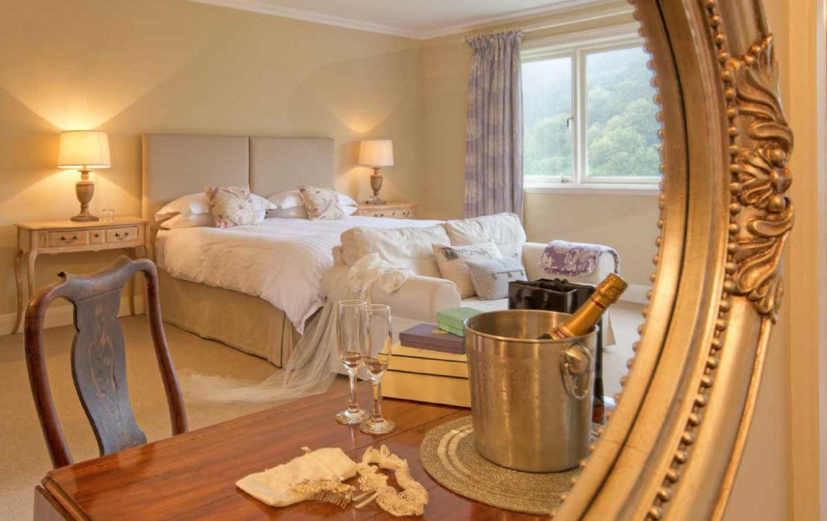 Bridal cottage at Dunglass House with double bed and champage in ice bucket
